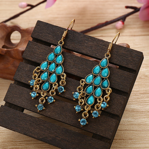 Boucles d'oreilles en éventail à pompons de paon, accessoire m3331112