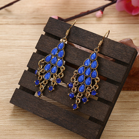 Boucles d'oreilles en éventail à pompons de paon, accessoire m3331112
