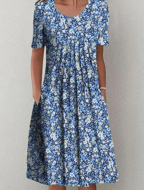 Frühling/Sommer Blumen bedrucktes Rundhals-Taschen-Mittellanges Kleid für Damenbekleidung m300037 