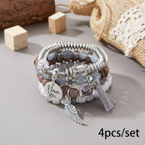 Nouveau bracelet bohème créatif à pompons et perles multicouches m3331286