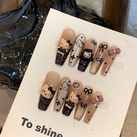 Handgetragene Maniküre in Premium Braun Hello Kitty Katzenauge Lang Weiß Abnehmbarer Fake Nagelaufkleber m3331216