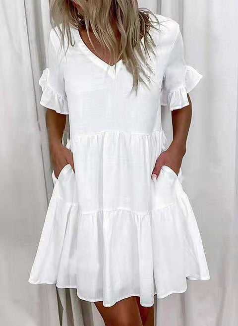 Kurzes Kleid mit Rüschen und Taschen und Print M300182 