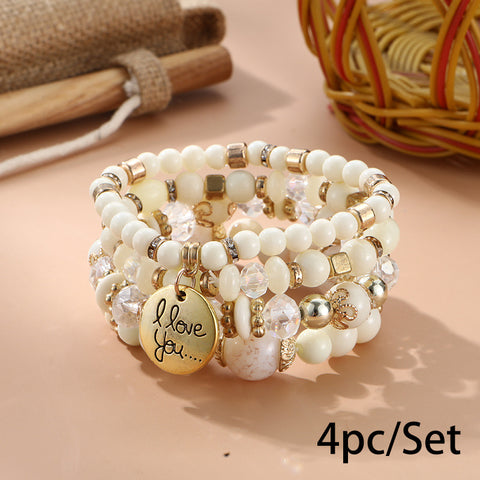 Nouveau bracelet bohème créatif à pompons et perles multicouches m3331286
