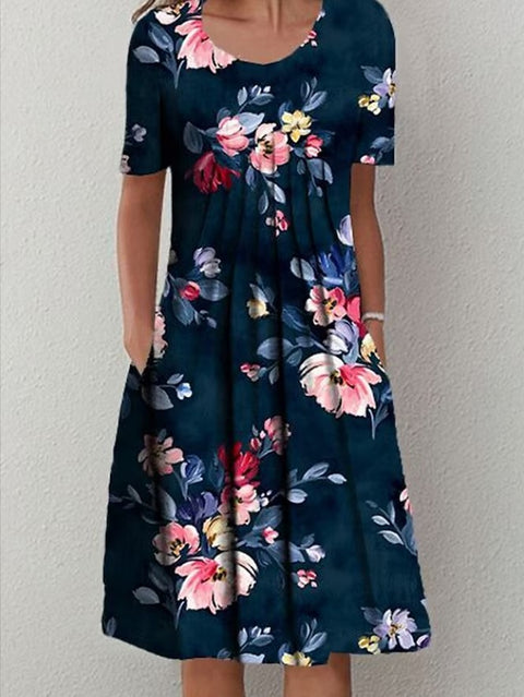 Frühling/Sommer Blumen bedrucktes Rundhals-Taschen-Mittellanges Kleid für Damenbekleidung m300037 