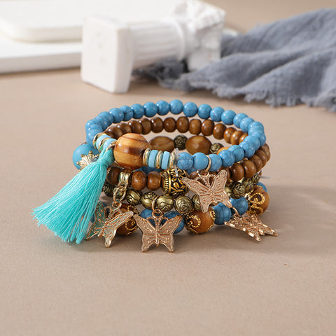 Nouveau bracelet bohème créatif à pompons et perles multicouches m3331286