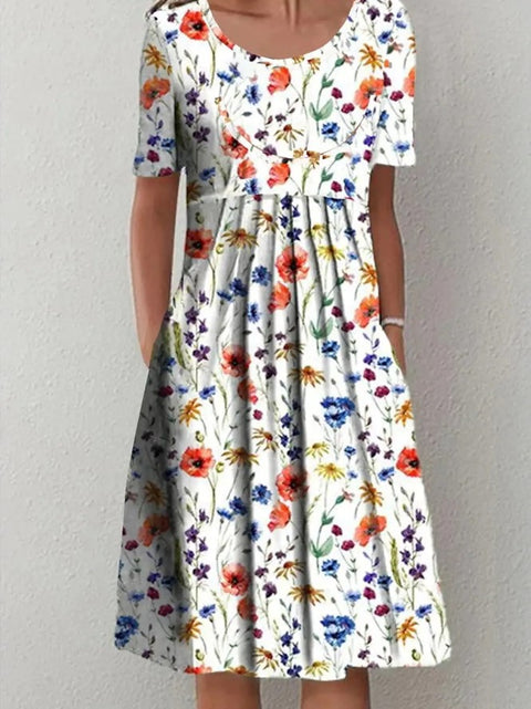 Frühling/Sommer Blumen bedrucktes Rundhals-Taschen-Mittellanges Kleid für Damenbekleidung m300037 