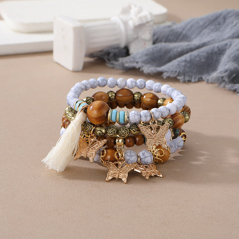 Nouveau bracelet bohème créatif à pompons et perles multicouches m3331286